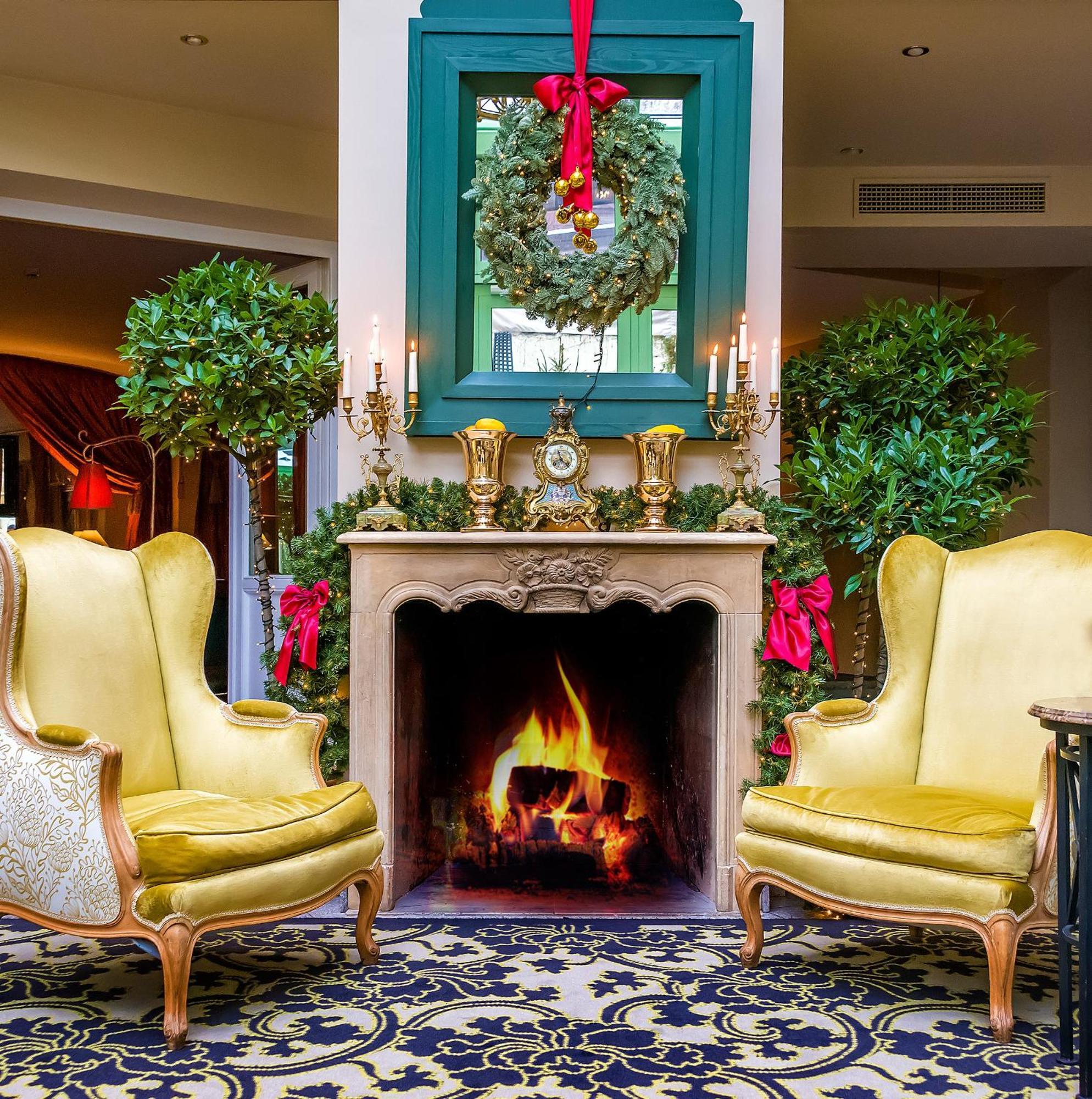 เรอแล แอนด์ ชาโต สติกลีไอ โฮเต็ล Aparthotel วิลนีอุส ภายนอก รูปภาพ The fireplace in the lobby
