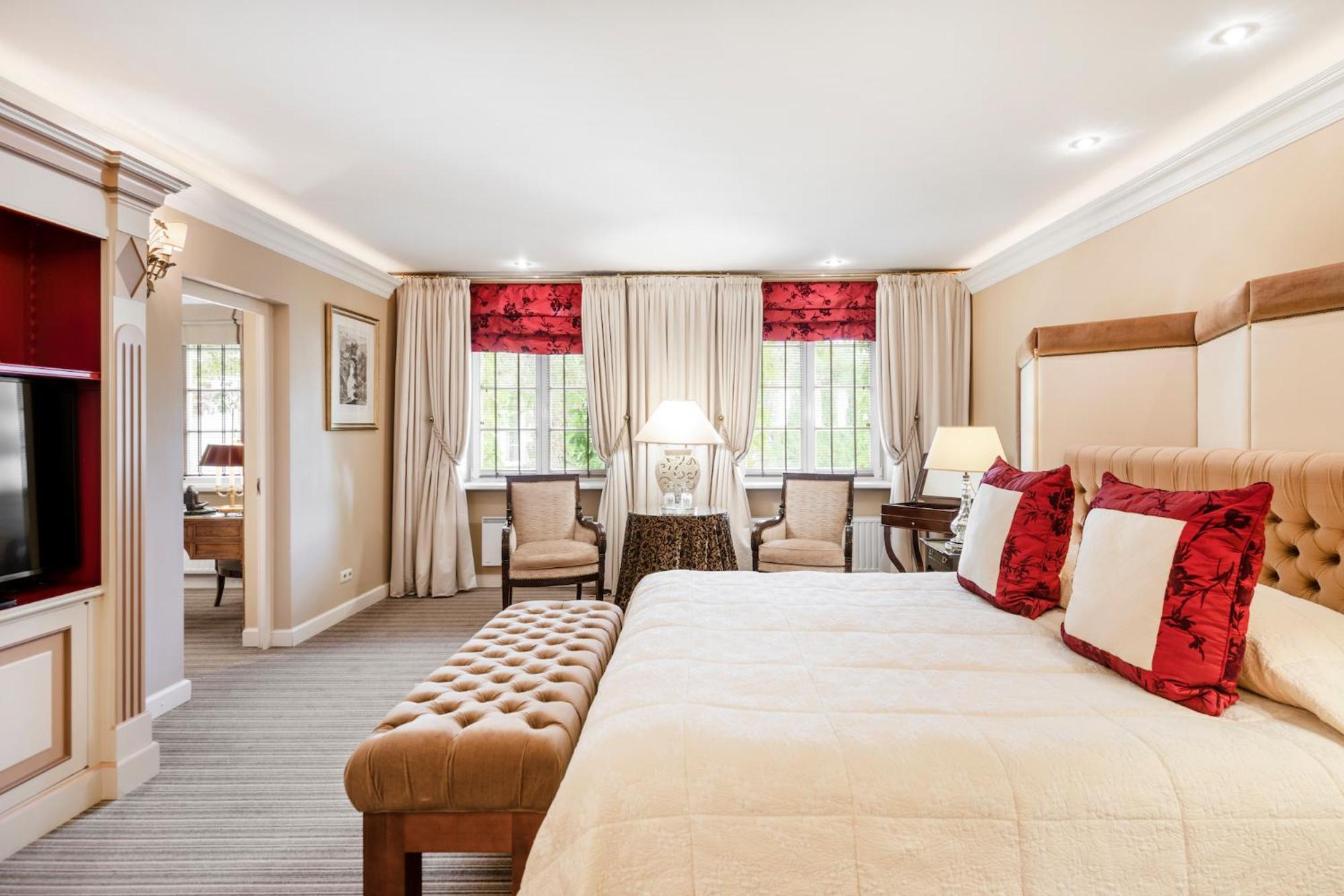 เรอแล แอนด์ ชาโต สติกลีไอ โฮเต็ล Aparthotel วิลนีอุส ห้อง รูปภาพ A bedroom at the hotel